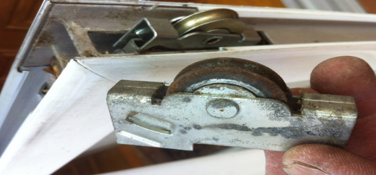 screen door roller repair in August